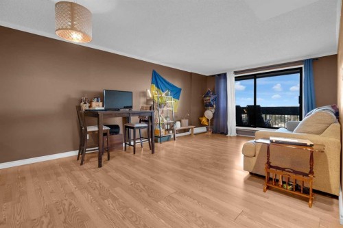 1006-9800 Horton Road Sw, Calgary, AB - Indoor Photo Showing Living Room