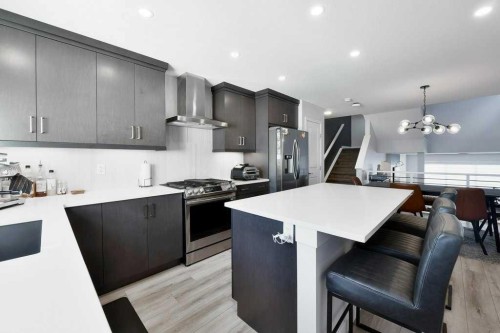 207 Aquila Way Nw, Calgary, AB - Indoor Photo Showing Kitchen With Upgraded Kitchen