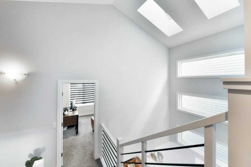 207 Aquila Way Nw, Calgary, AB - Indoor Photo Showing Other Room