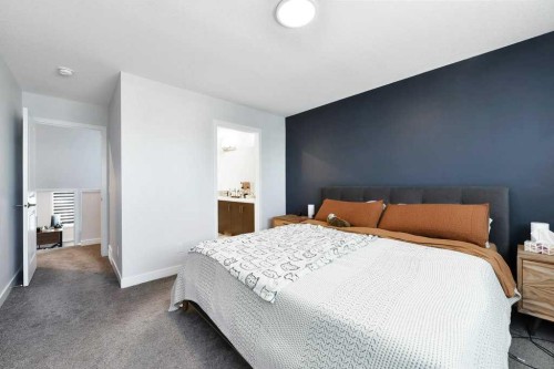 207 Aquila Way Nw, Calgary, AB - Indoor Photo Showing Bedroom