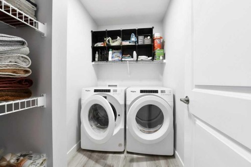 207 Aquila Way Nw, Calgary, AB - Indoor Photo Showing Laundry Room