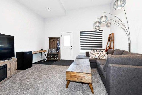 207 Aquila Way Nw, Calgary, AB - Indoor Photo Showing Living Room