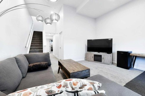 207 Aquila Way Nw, Calgary, AB - Indoor Photo Showing Other Room