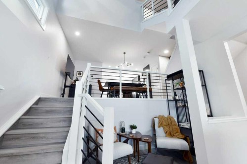 207 Aquila Way Nw, Calgary, AB - Indoor Photo Showing Other Room