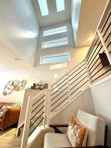 207 Aquila Way Nw, Calgary, AB - Indoor Photo Showing Other Room