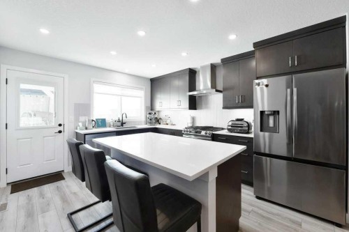 207 Aquila Way Nw, Calgary, AB - Indoor Photo Showing Kitchen With Upgraded Kitchen