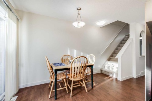 704-2445 Kingsland Road Se, Airdrie, AB - Indoor Photo Showing Dining Room