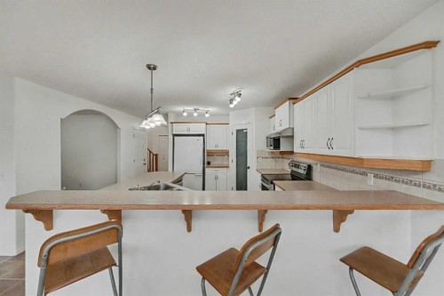 12 Tarawood Grove Ne, Calgary, AB - Indoor Photo Showing Kitchen With Double Sink