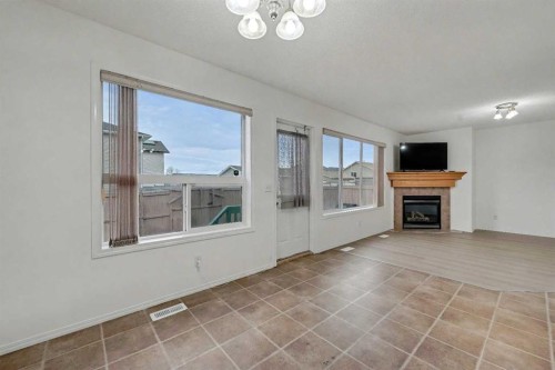 12 Tarawood Grove Ne, Calgary, AB - Indoor Photo Showing Living Room With Fireplace
