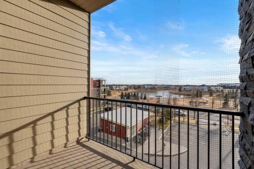 412-5 Saddlestone Way Ne, Calgary, AB - Outdoor With Balcony With Exterior