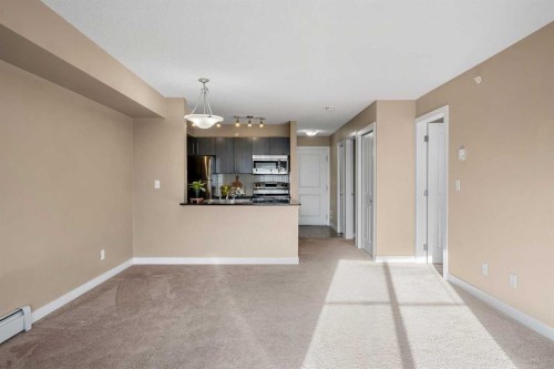 412-5 Saddlestone Way Ne, Calgary, AB - Indoor Photo Showing Other Room