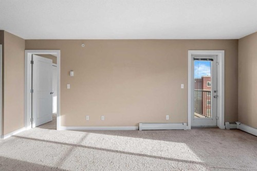412-5 Saddlestone Way Ne, Calgary, AB - Indoor Photo Showing Other Room