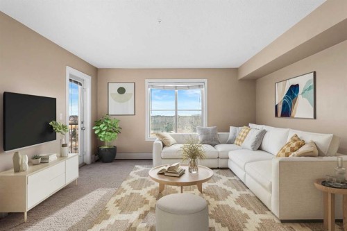 412-5 Saddlestone Way Ne, Calgary, AB - Indoor Photo Showing Living Room