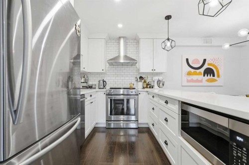 310-1111 13 Avenue Sw, Calgary, AB - Indoor Photo Showing Kitchen With Stainless Steel Kitchen With Upgraded Kitchen