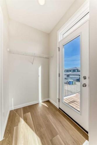 32 Creekside Rise Sw, Calgary, AB - Indoor Photo Showing Other Room