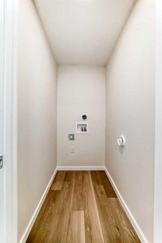 32 Creekside Rise Sw, Calgary, AB - Indoor Photo Showing Other Room