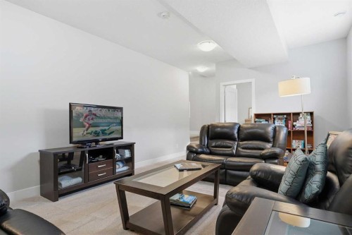 204-20 Silverado Crest Park Sw, Calgary, AB - Indoor Photo Showing Living Room