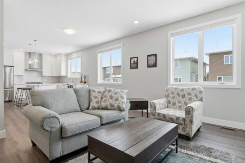 204-20 Silverado Crest Park Sw, Calgary, AB - Indoor Photo Showing Living Room