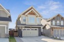 206 Riviera View, Cochrane, AB  - Outdoor With Facade 