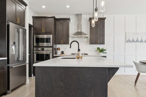 206 Riviera View, Cochrane, AB - Indoor Photo Showing Kitchen With Upgraded Kitchen
