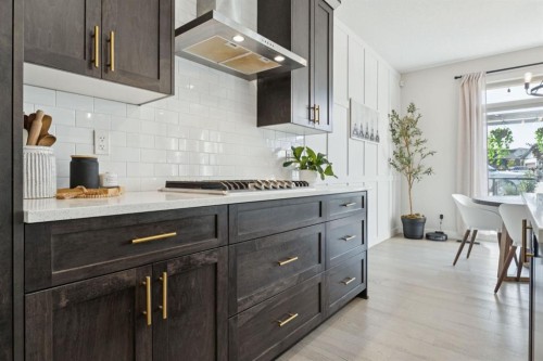 206 Riviera View, Cochrane, AB - Indoor Photo Showing Kitchen