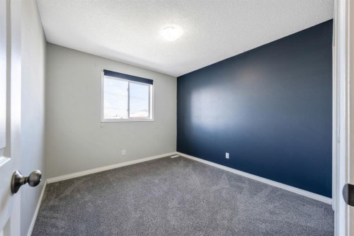 55 Mt Apex Green Se, Calgary, AB - Indoor Photo Showing Other Room