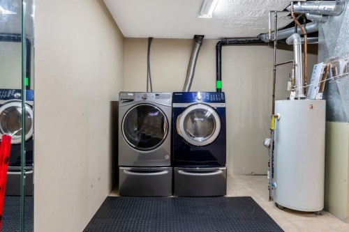 55 Mt Apex Green Se, Calgary, AB - Indoor Photo Showing Laundry Room