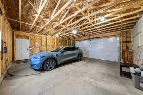 55 Mt Apex Green Se, Calgary, AB - Indoor Photo Showing Garage