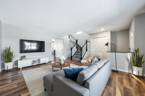 55 Mt Apex Green Se, Calgary, AB - Indoor Photo Showing Living Room