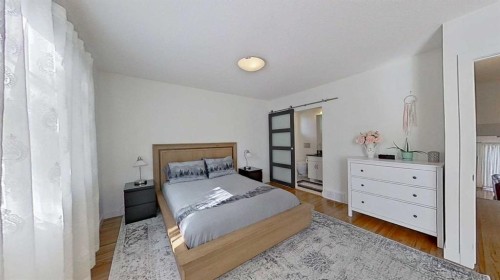 2932 Lathom Crescent Sw, Calgary, AB - Indoor Photo Showing Bedroom