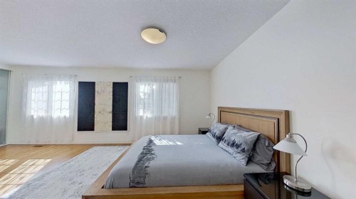 2932 Lathom Crescent Sw, Calgary, AB - Indoor Photo Showing Bedroom