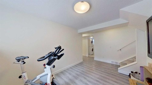 2932 Lathom Crescent Sw, Calgary, AB - Indoor Photo Showing Gym Room