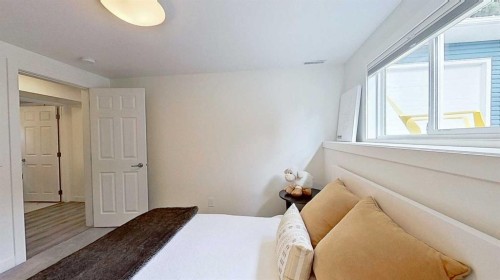 2932 Lathom Crescent Sw, Calgary, AB - Indoor Photo Showing Bedroom