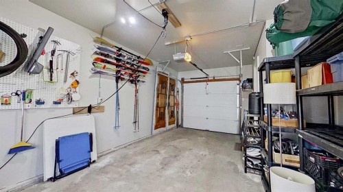 2932 Lathom Crescent Sw, Calgary, AB - Indoor Photo Showing Garage