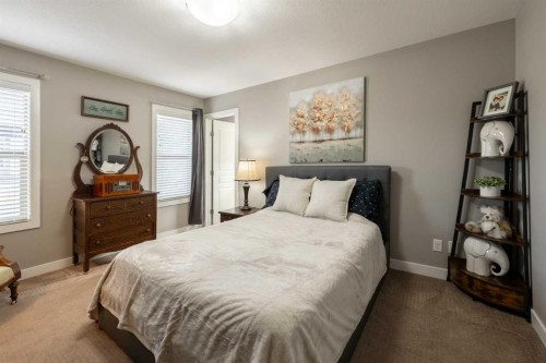 1201-32 Horseshoe Crescent, Cochrane, AB - Indoor Photo Showing Bedroom