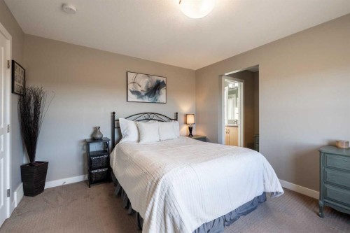 1201-32 Horseshoe Crescent, Cochrane, AB - Indoor Photo Showing Bedroom