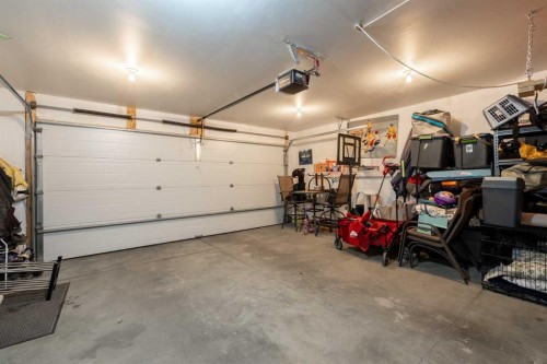 1201-32 Horseshoe Crescent, Cochrane, AB - Indoor Photo Showing Garage