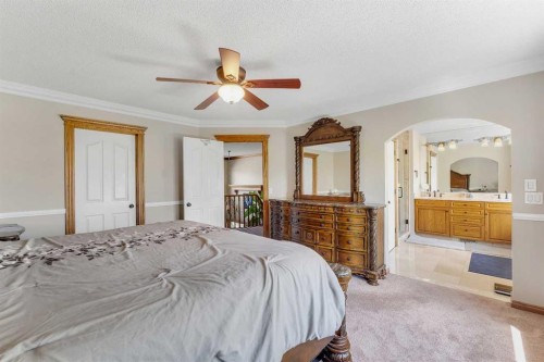 33 Edgevalley Way Nw, Calgary, AB - Indoor Photo Showing Bedroom