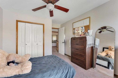 33 Edgevalley Way Nw, Calgary, AB - Indoor Photo Showing Bedroom