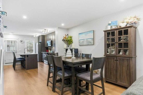 410-338 Seton Circle Se, Calgary, AB - Indoor Photo Showing Dining Room