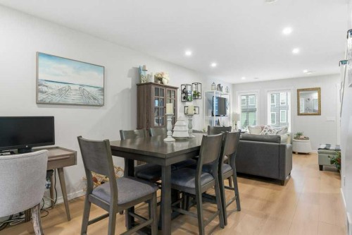 410-338 Seton Circle Se, Calgary, AB - Indoor Photo Showing Dining Room