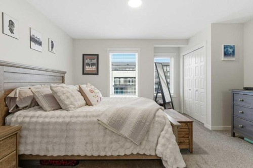 410-338 Seton Circle Se, Calgary, AB - Indoor Photo Showing Bedroom