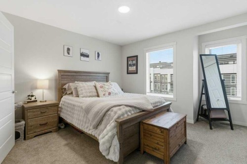 410-338 Seton Circle Se, Calgary, AB - Indoor Photo Showing Bedroom