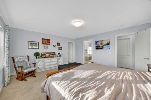 264 Boulder Creek Crescent Se, Langdon, AB - Indoor Photo Showing Bedroom