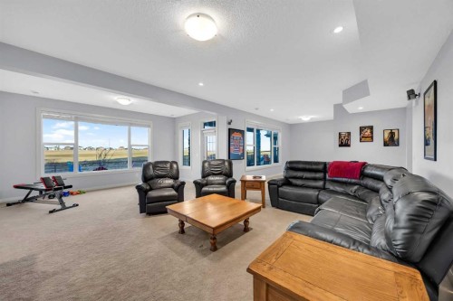 264 Boulder Creek Crescent Se, Langdon, AB - Indoor Photo Showing Living Room