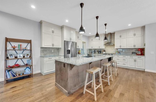 264 Boulder Creek Crescent Se, Langdon, AB - Indoor Photo Showing Kitchen With Upgraded Kitchen