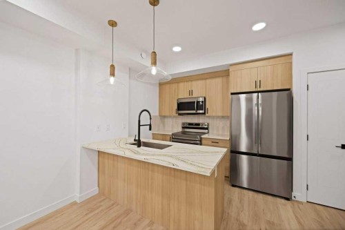 572 Seton Circle, Calgary, AB - Indoor Photo Showing Kitchen With Stainless Steel Kitchen