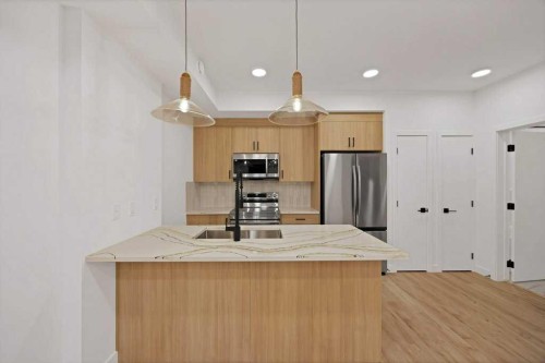 572 Seton Circle, Calgary, AB - Indoor Photo Showing Kitchen With Stainless Steel Kitchen