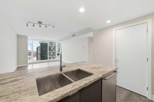 1505-519 Riverfront Avenue Se, Calgary, AB - Indoor Photo Showing Kitchen With Double Sink