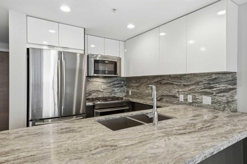 1505-519 Riverfront Avenue Se, Calgary, AB - Indoor Photo Showing Kitchen With Stainless Steel Kitchen With Double Sink With Upgraded Kitchen